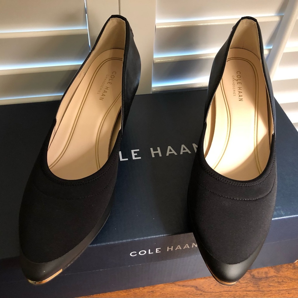 Cole Haan Grandseries Black Wedges with Fashionable “mudguard”.